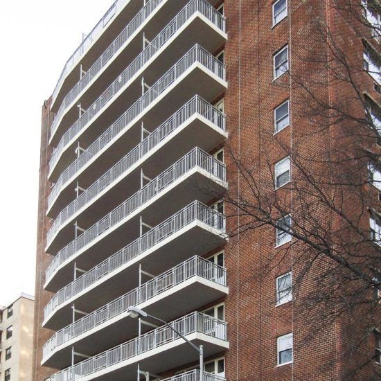 a tall building with balconies and balconies on it