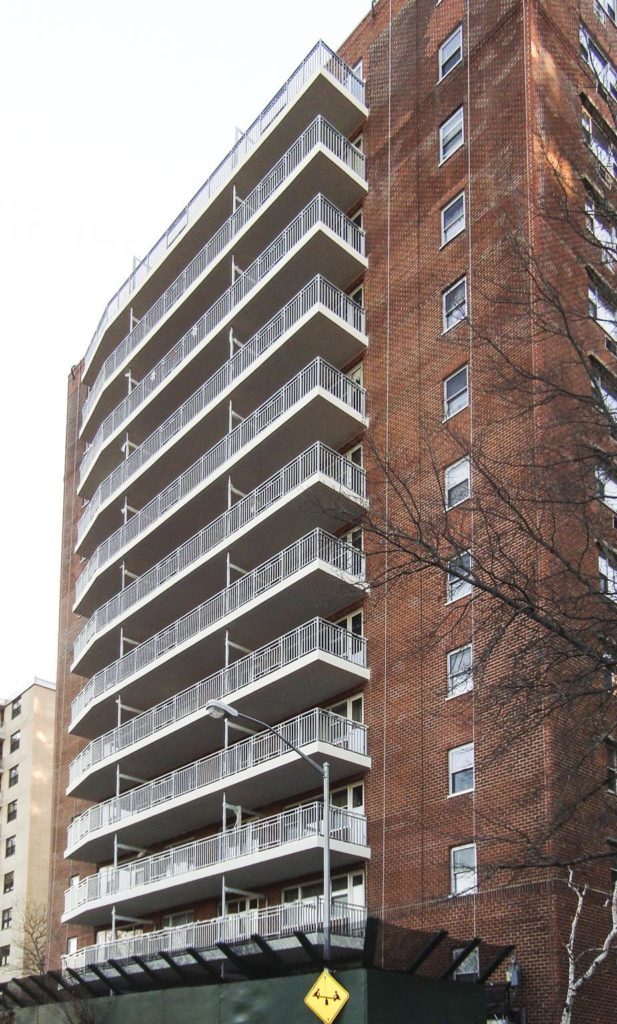a tall building with balconies and balconies on it