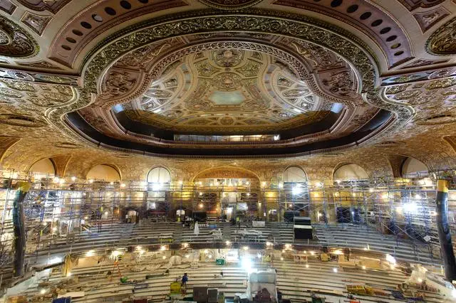 the interior of a large library filled with lots of books