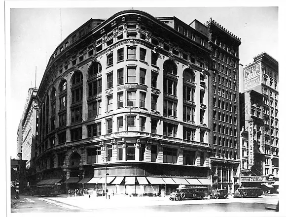 an old photo of the corner of a building