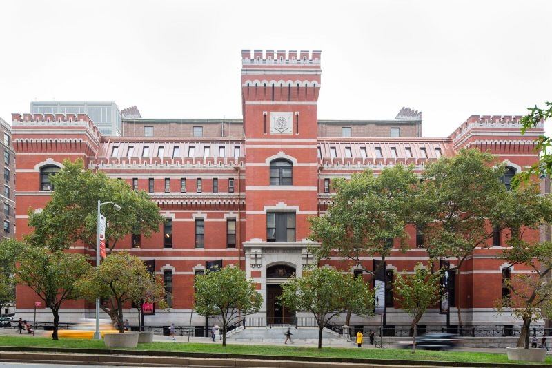 a red brick building with a clock tower