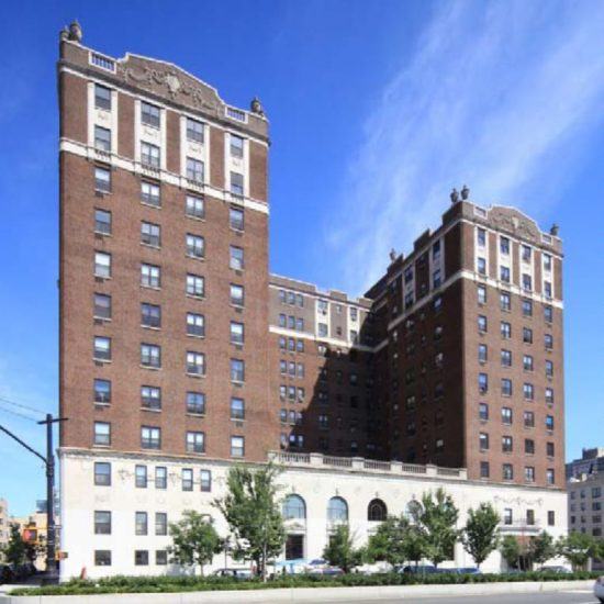 a large brick building sitting next to a street