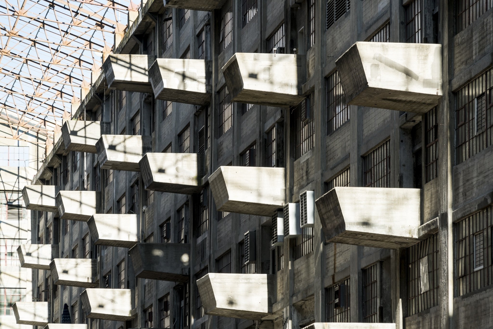 a building with many windows and balconies