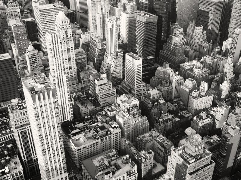an aerial view of new york city with skyscrapers