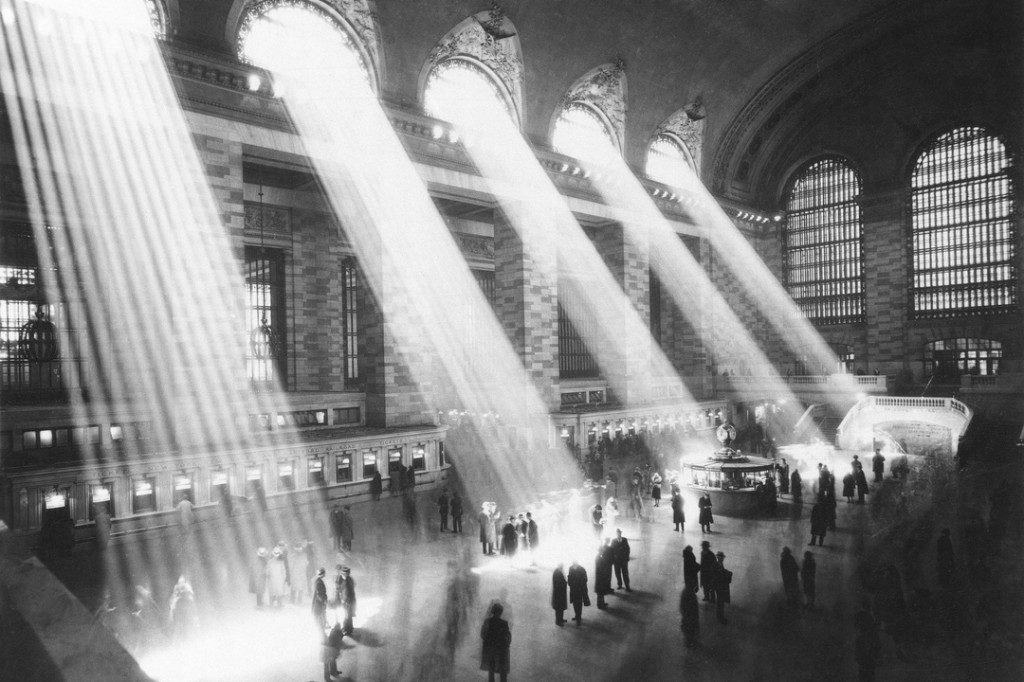 the sun shines through the windows in an old train station