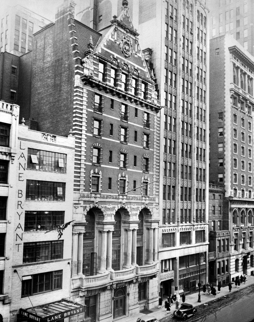 a black and white photo of buildings in the city