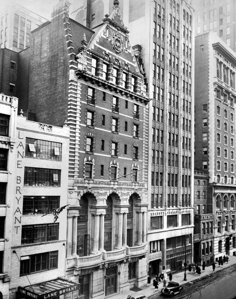 a black and white photo of buildings in the city