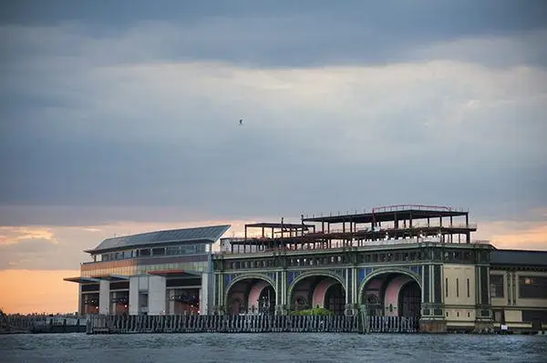 a large building sitting on top of a body of water