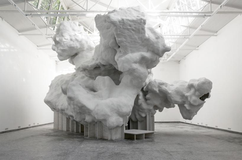 a large sculpture in a white room