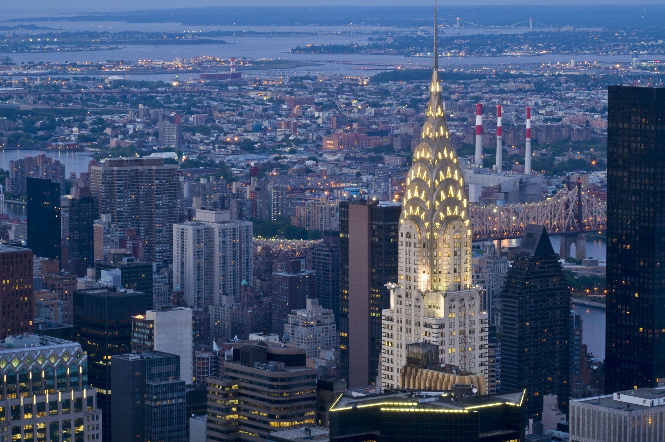 a view of a city at night from the top of a building