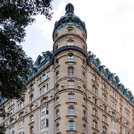 a very tall building with many windows on top