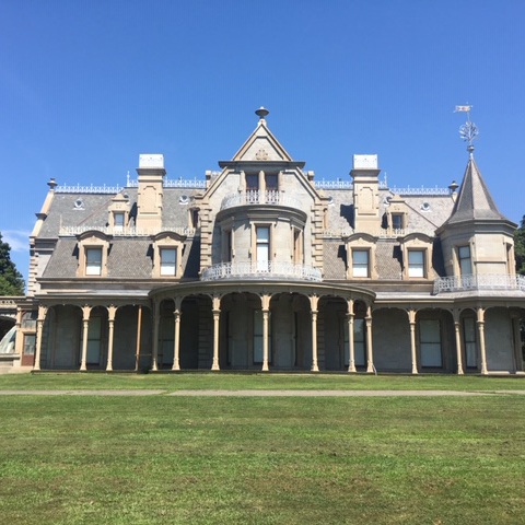 a large building with many windows and columns