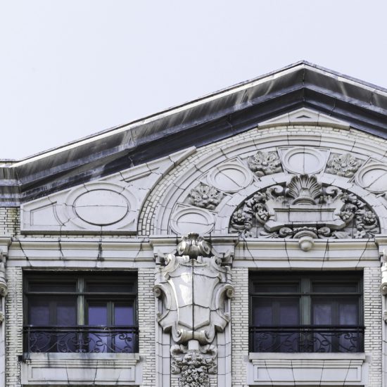 an old building with ornate carvings and windows