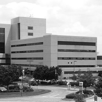 a black and white photo of an office building